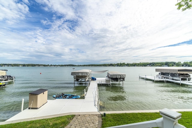 dock area featuring a water view and boat lift