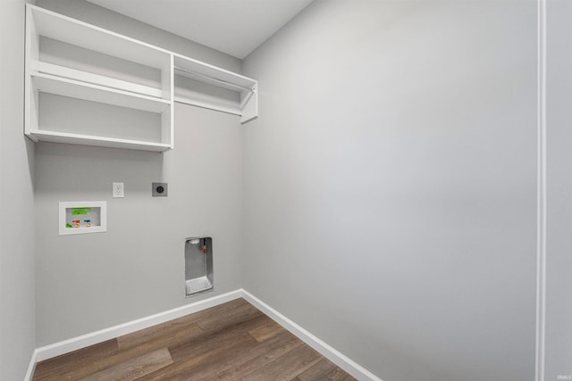 laundry area with laundry area, baseboards, dark wood-style flooring, washer hookup, and electric dryer hookup