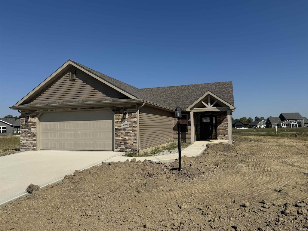 view of front of home with a garage