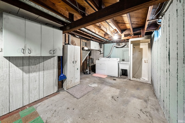 basement featuring washer and clothes dryer