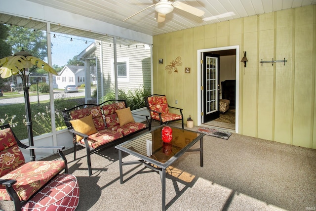 sunroom / solarium with ceiling fan