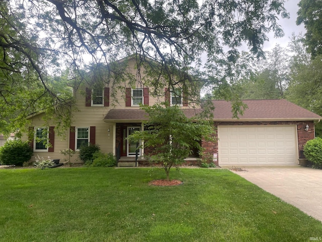 front of property with a front lawn and a garage