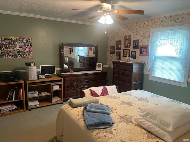 carpeted bedroom featuring ceiling fan, crown molding, and a textured ceiling