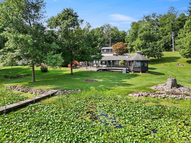 view of yard featuring a gazebo and a wooden deck