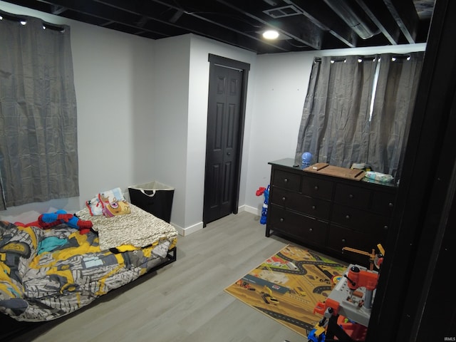 bedroom featuring light wood-type flooring