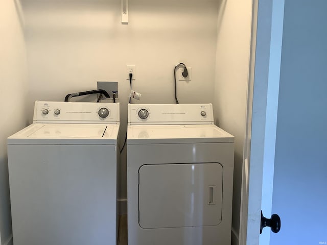 washroom with washer and clothes dryer