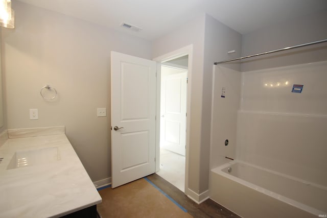 bathroom featuring shower / bathing tub combination and vanity