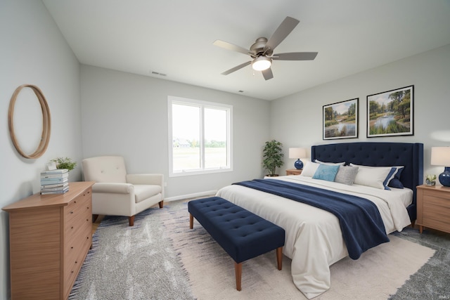 carpeted bedroom with ceiling fan