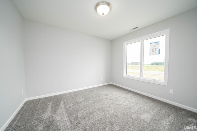 empty room with carpet floors