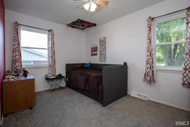 carpeted bedroom with ceiling fan