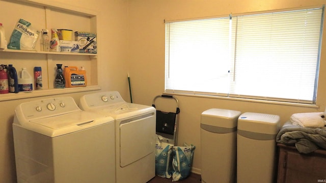 clothes washing area with washer and dryer