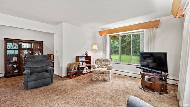 carpeted living room with a baseboard radiator