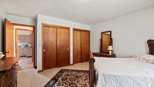 bedroom with two closets