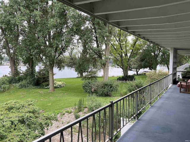 balcony featuring a water view