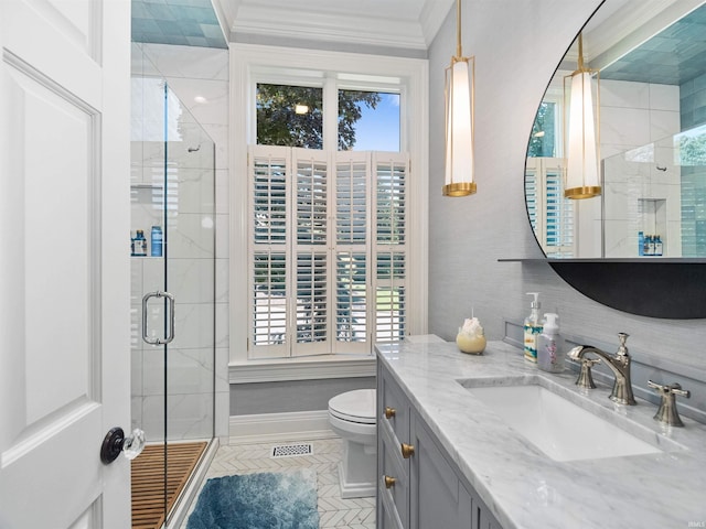 bathroom with walk in shower, vanity, crown molding, tile patterned flooring, and toilet