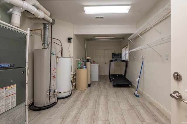 utilities featuring heating unit and water heater