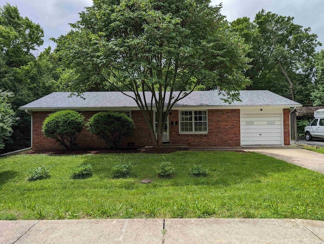 single story home with a garage and a front yard