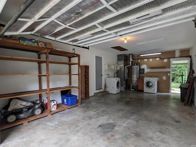 garage with separate washer and dryer and water heater