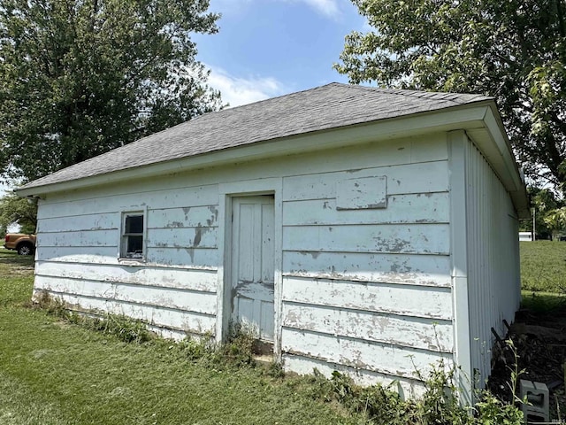 view of outdoor structure with a yard