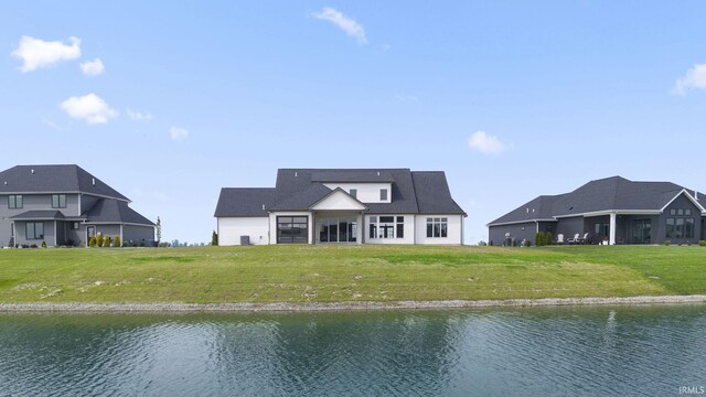 12279 Blue Jay Trl, Fort Wayne, IN 46814 - back of house with a water view and a lawn
