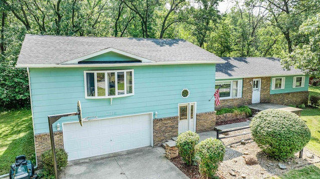 view of front of home featuring a garage