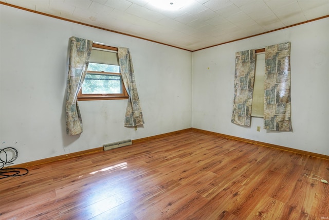 empty room featuring wood-type flooring