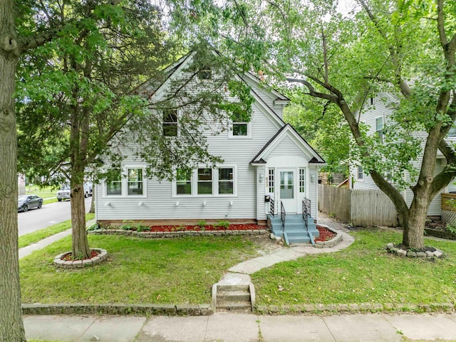 view of front of property with a front lawn