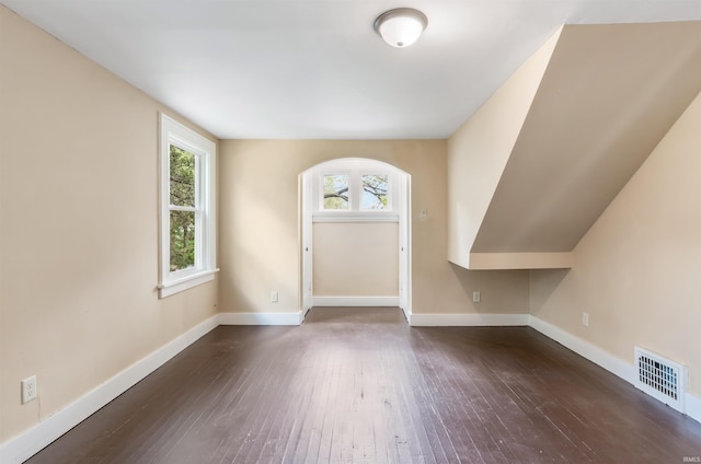 foyer with plenty of natural light and dark hardwood / wood-style floors