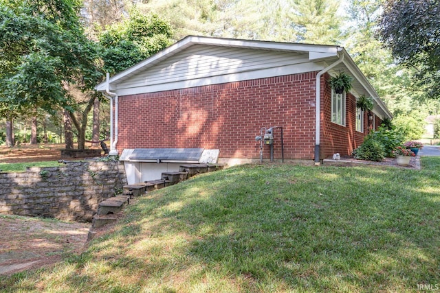 view of property exterior featuring a yard