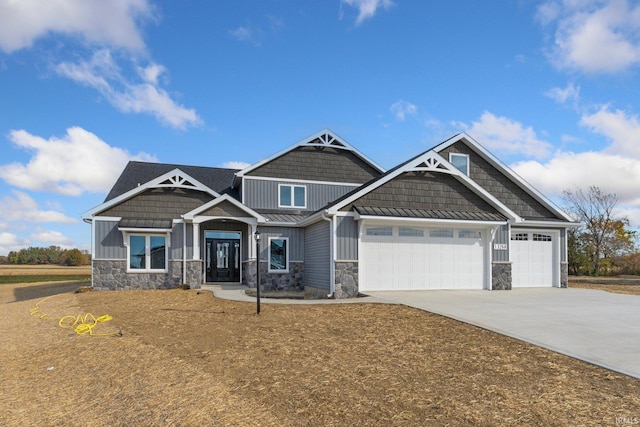 craftsman house with a garage