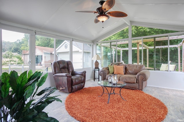 sunroom featuring ceiling fan and lofted ceiling