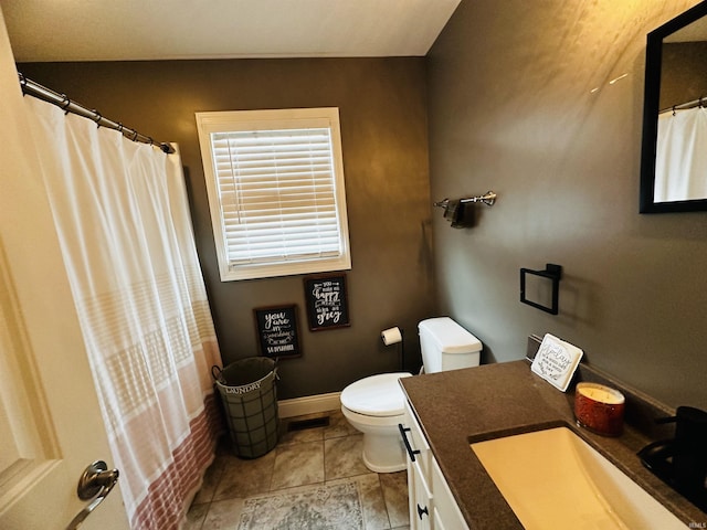 bathroom with vanity, tile patterned flooring, a shower with curtain, and toilet