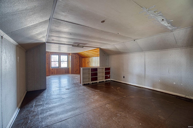 bonus room featuring lofted ceiling