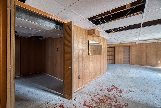 basement with wooden walls