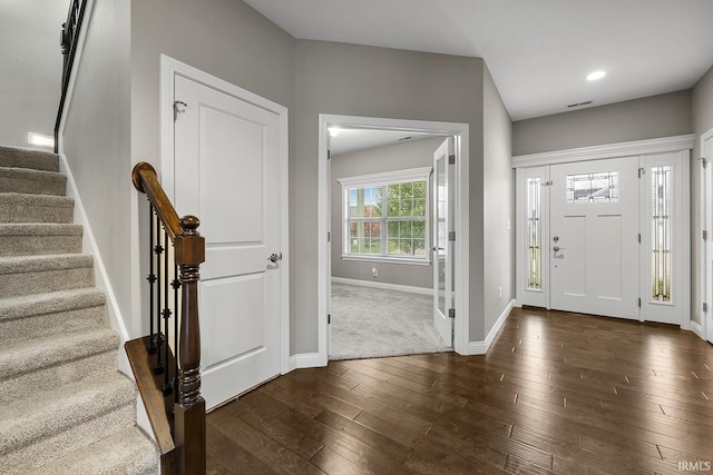 entrance foyer featuring dark wood-type flooring