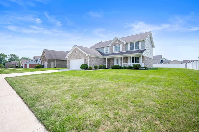 view of front facade with a front lawn and a garage