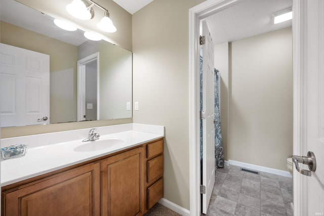 bathroom featuring vanity