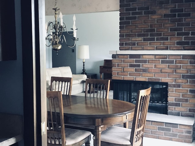 dining space featuring an inviting chandelier