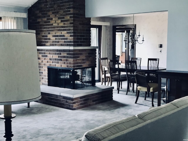 living room featuring a brick fireplace and carpet flooring