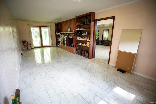 unfurnished living room featuring light tile patterned flooring