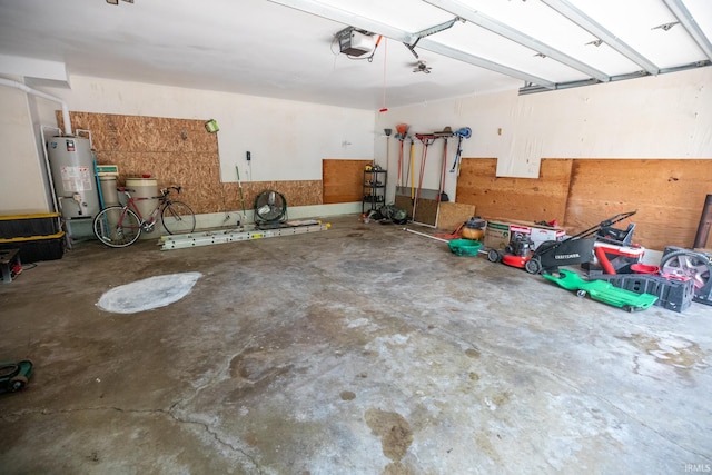 garage with water heater and a garage door opener