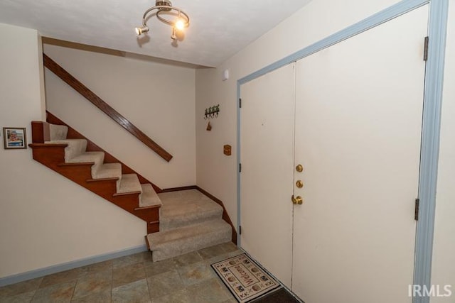 view of tiled entrance foyer