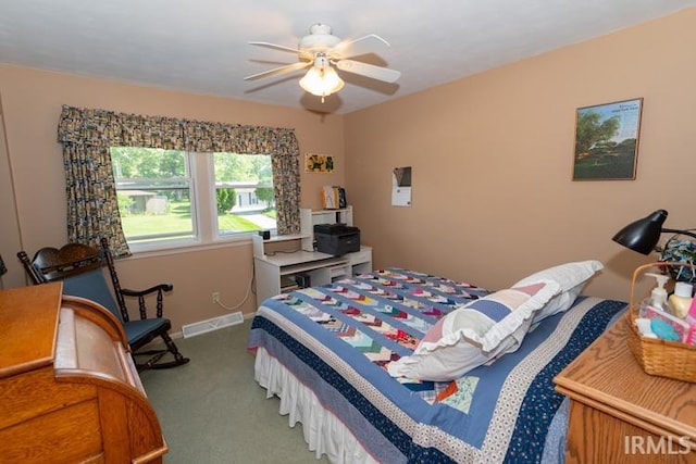 carpeted bedroom with ceiling fan