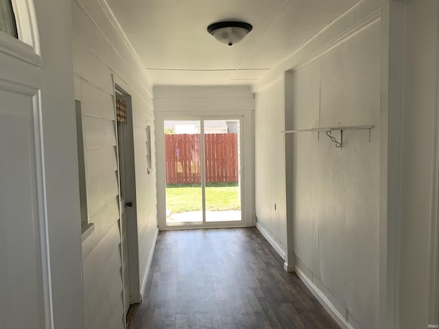 corridor featuring dark hardwood / wood-style flooring