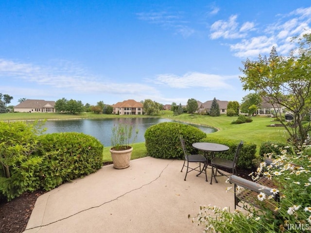 view of patio featuring a water view