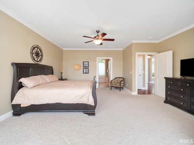 bedroom featuring light carpet, ceiling fan, and crown molding