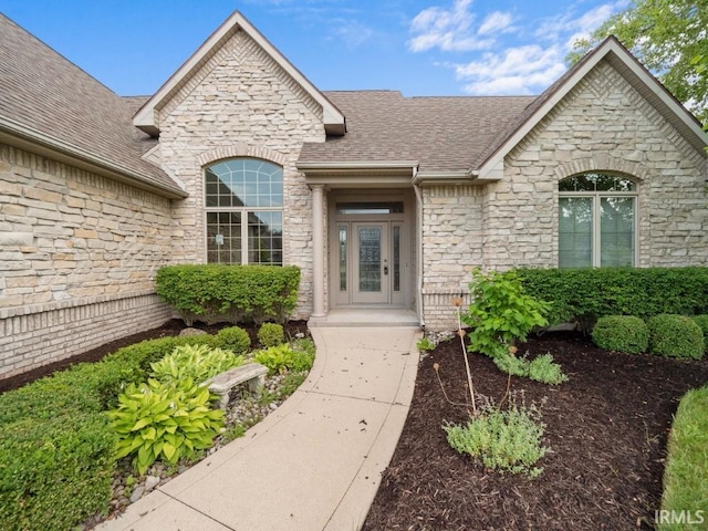 entrance to property featuring french doors