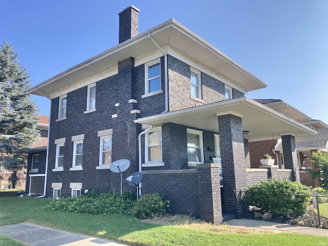 view of side of home featuring covered porch