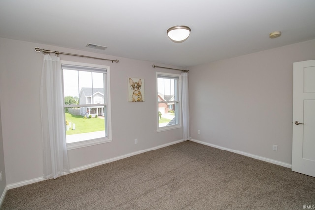 view of carpeted spare room