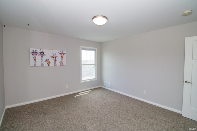 unfurnished room with carpet